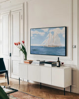 Majestic Sailboat White Sails by James Wiens. shown as a framed stretched canvas in a living room above a console. Available as a archival giclee rolled canvas, fine art paper, or poster print. SKU 61168i.