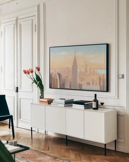 Manhattan Dawn by James Wiens. shown as a framed stretched canvas in a living room above a console. Available as a archival giclee rolled canvas, fine art paper, or poster print. SKU 65981i.