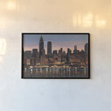 Manhattan Reflection by James Wiens. shown as a paper print in a black flame. Available as a archival giclee rolled canvas, fine art paper, or poster print. SKU 13551i.