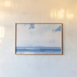 Oceanview Sail by James Wiens. shown as a paper print in a natural frame. Available as a archival giclee rolled canvas, fine art paper, or poster print. SKU 63184i.