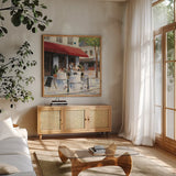 Relaxing at the Cafe I by James Wiens. Shown in a natural wood frame in a cozy modern living room. Available as an archival giclee rolled canvas, fine art paper, or poster print. SKU 12967a.