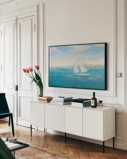Sailing Into the Blue by James Wiens. shown as a framed stretched canvas in a living room above a console. Available as a archival giclee rolled canvas, fine art paper, or poster print. SKU 76006i.