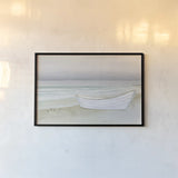 Serene Seaside with Boat by James Wiens. shown as a paper print in a black flame. Available as a archival giclee rolled canvas, fine art paper, or poster print. SKU 33505i.
