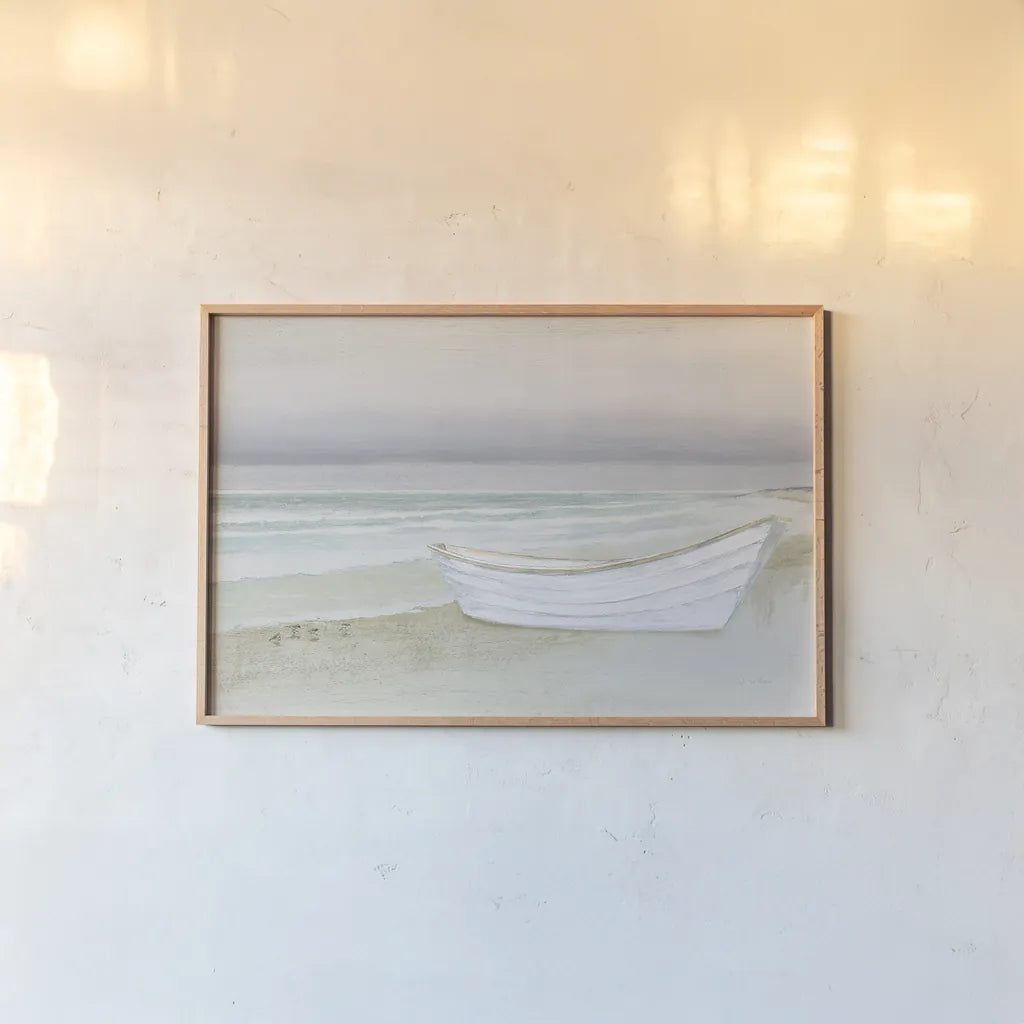 Serene Seaside with Boat by James Wiens. shown as a paper print in a natural frame. Available as a archival giclee rolled canvas, fine art paper, or poster print. SKU 33505i.
