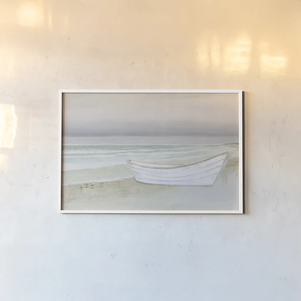 Serene Seaside with Boat by James Wiens. shown as a paper print in a white frame. Available as a archival giclee rolled canvas, fine art paper, or poster print. SKU 33505i.