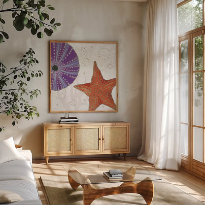 Shimmering Shells III by James Wiens. Shown in a natural wood frame in a cozy modern living room. Available as an archival giclee rolled canvas, fine art paper, or poster print. SKU 72588a.