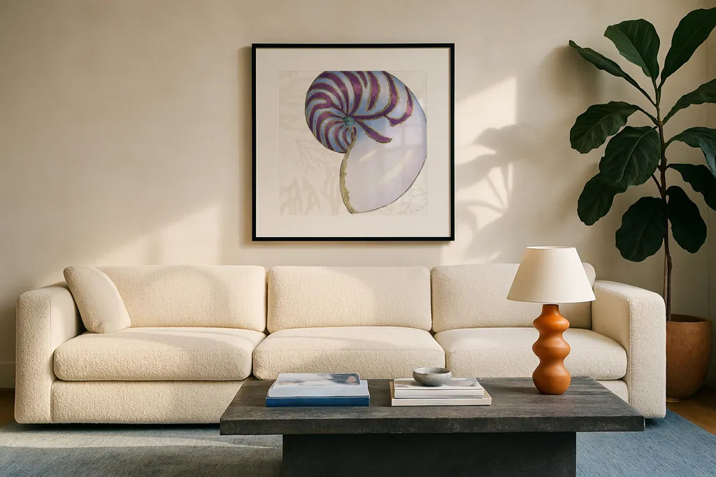 Shimmering Shells VI by James Wiens. Displayed in a glass frame with matte in a clean modern living room. Available as an archival giclee rolled canvas, fine art paper, or poster print. SKU 72591a.
