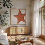 Shimmering Shells XIII by James Wiens. Shown in a natural wood frame in a cozy modern living room. Available as an archival giclee rolled canvas, fine art paper, or poster print. SKU 72598a.