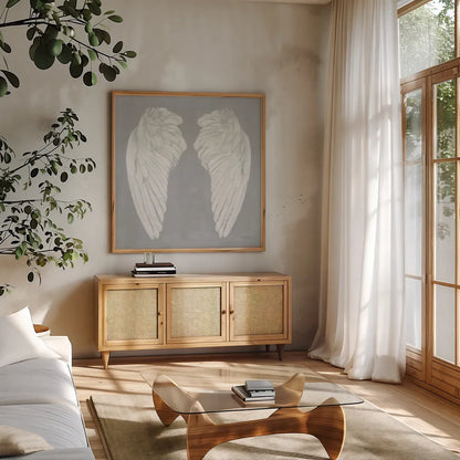 Wings I on Gray Flipped by James Wiens. Shown in a natural wood frame in a cozy modern living room. Available as an archival giclee rolled canvas, fine art paper, or poster print. SKU 80197a.