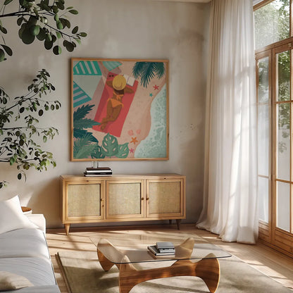 Beach Babes I by Janelle Penner. Shown in a natural wood frame in a cozy modern living room. Available as an archival giclee rolled canvas, fine art paper, or poster print. SKU 67175a.