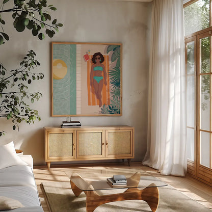 Beach Babes III by Janelle Penner. Shown in a natural wood frame in a cozy modern living room. Available as an archival giclee rolled canvas, fine art paper, or poster print. SKU 67177a.