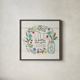 Blooming Thoughts I by Janelle Penner. Shown in a sleek black glass frame for a contemporary gallery look. Available as an archival giclee rolled canvas, fine art paper, or poster print. SKU 29080a.