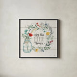Blooming Thoughts II by Janelle Penner. Shown in a sleek black glass frame for a contemporary gallery look. Available as an archival giclee rolled canvas, fine art paper, or poster print. SKU 29081a.