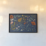 Blue Botanical I by Janelle Penner. shown as a paper print in a black flame. Available as a archival giclee rolled canvas, fine art paper, or poster print. SKU 48600i.