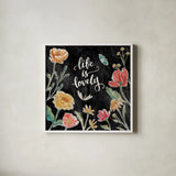 Boho Field IV Black by Janelle Penner. Shown in a crisp white glass frame for a clean and minimalist style. Available as an archival giclee rolled canvas, fine art paper, or poster print. SKU 52072a.