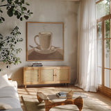Coffee and Co IV Neutral by Janelle Penner. Shown in a natural wood frame in a cozy modern living room. Available as an archival giclee rolled canvas, fine art paper, or poster print. SKU 83405a.
