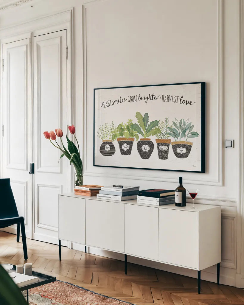 Fine Herbs I by Janelle Penner. shown as a framed stretched canvas in a living room above a console. Available as a archival giclee rolled canvas, fine art paper, or poster print. SKU 34993i.