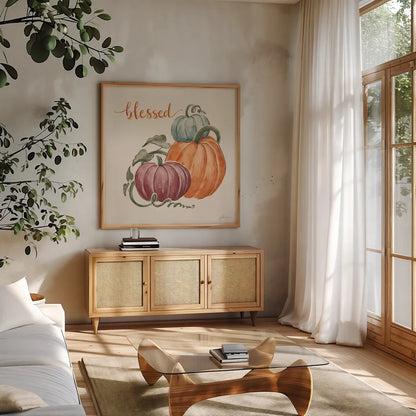 Harvest Jewels IV Pumpkins Sq by Janelle Penner. Shown in a natural wood frame in a cozy modern living room. Available as an archival giclee rolled canvas, fine art paper, or poster print. SKU 75095a.