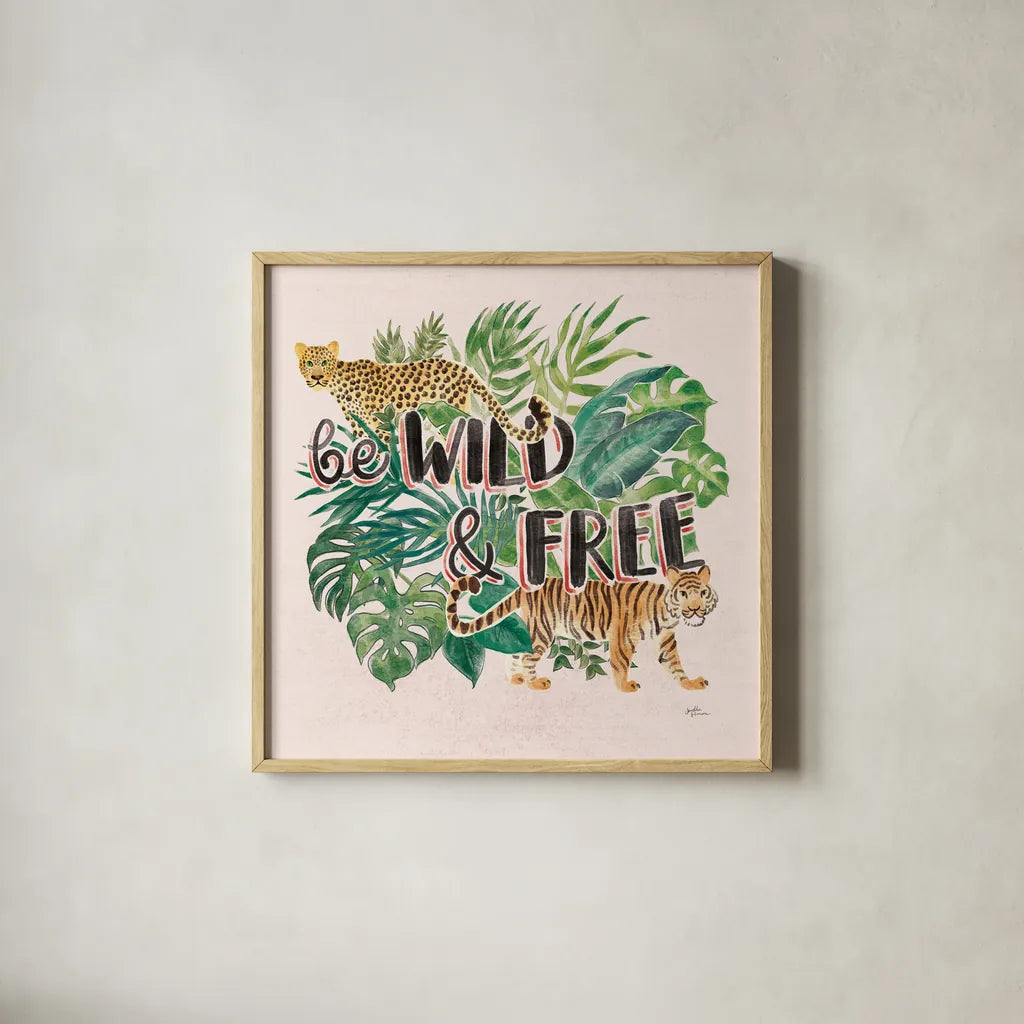 Jungle Vibes VII - Be Wild and Free Pink by Janelle Penner. Shown in a natural wood glass frame for a timeless modern aesthetic. Available as an archival giclee rolled canvas, fine art paper, or poster print. SKU 47198a.
