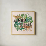 Jungle Vibes VII - Be Wild and Free Pink by Janelle Penner. Shown in a natural wood glass frame for a timeless modern aesthetic. Available as an archival giclee rolled canvas, fine art paper, or poster print. SKU 47198a.