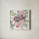 Live in Bloom II by Janelle Penner. Shown in a crisp white glass frame for a clean and minimalist style. Available as an archival giclee rolled canvas, fine art paper, or poster print. SKU 45941a.