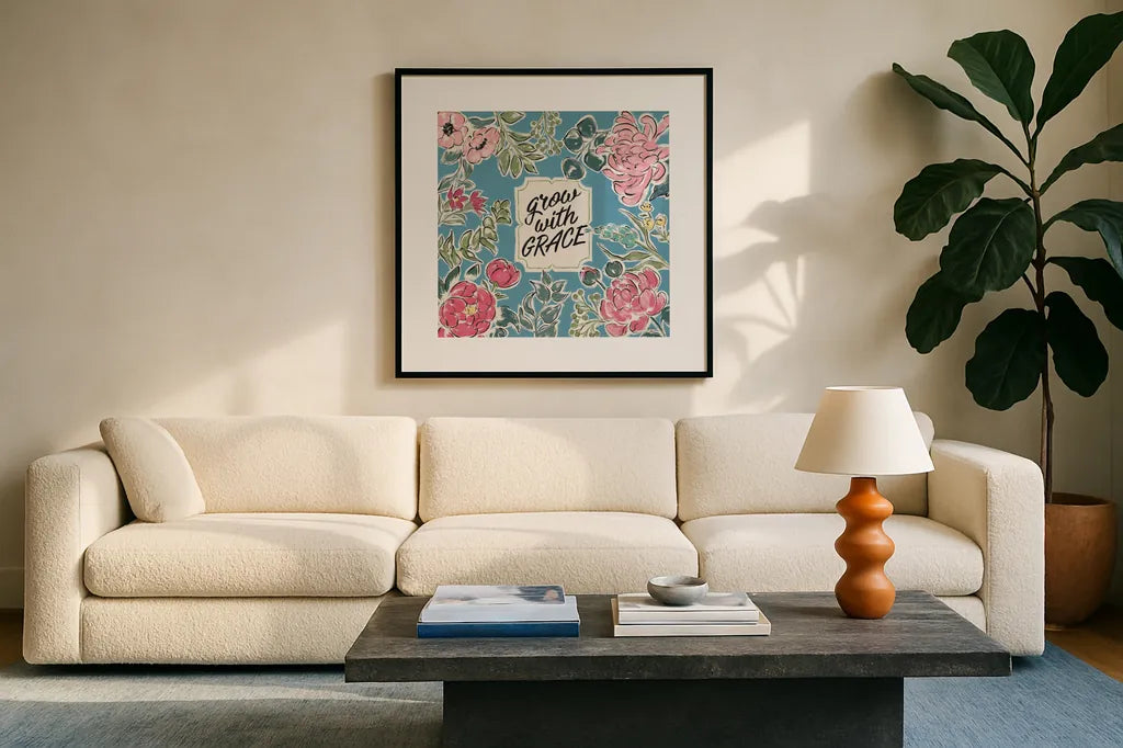 Live in Bloom IV Blue by Janelle Penner. Displayed in a glass frame with matte in a clean modern living room. Available as an archival giclee rolled canvas, fine art paper, or poster print. SKU 47199a.
