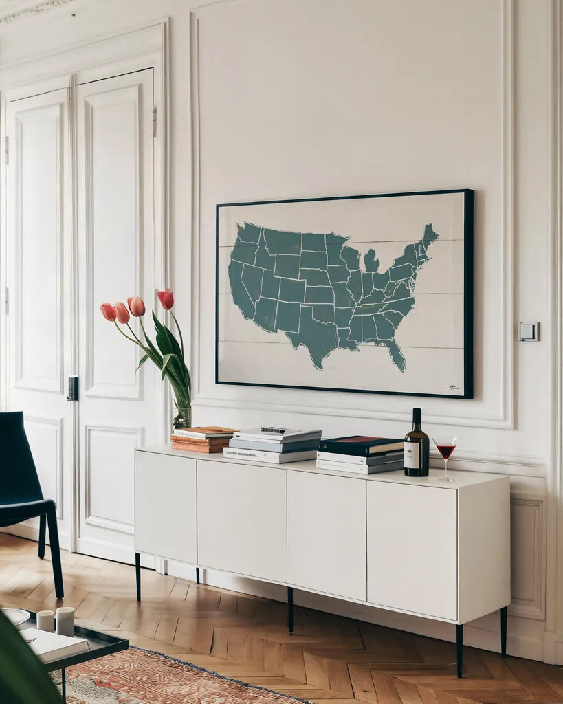 Peace and Lodge USA Map by Janelle Penner. shown as a framed stretched canvas in a living room above a console. Available as a archival giclee rolled canvas, fine art paper, or poster print. SKU 63363i.