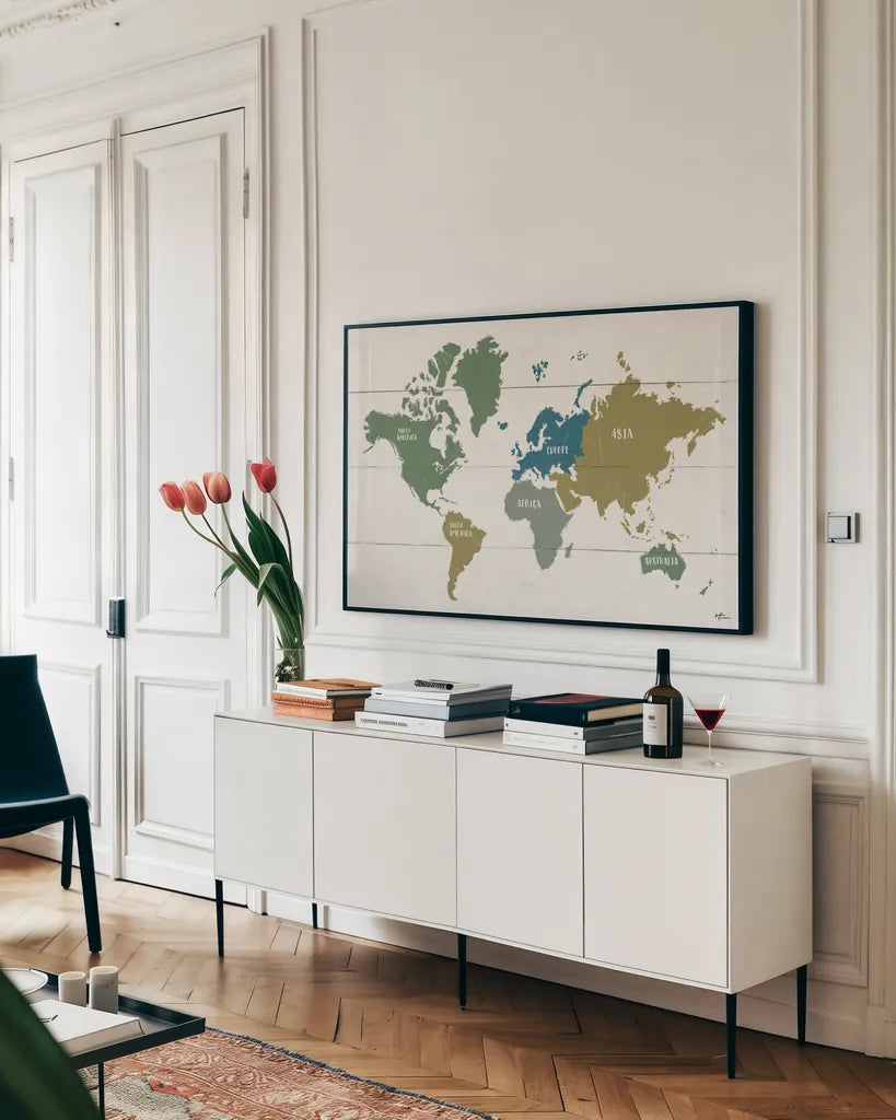 Peace and Lodge World Map by Janelle Penner. shown as a framed stretched canvas in a living room above a console. Available as a archival giclee rolled canvas, fine art paper, or poster print. SKU 63362i.