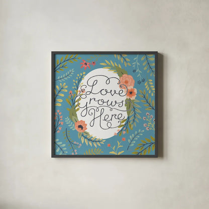 Retro Garden II - Love Grows Here Blue by Janelle Penner. Shown in a sleek black glass frame for a contemporary gallery look. Available as an archival giclee rolled canvas, fine art paper, or poster print. SKU 47196a.