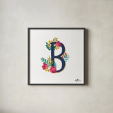 Romantic Luxe B Navy by Janelle Penner. Shown in a sleek black glass frame for a contemporary gallery look. Available as an archival giclee rolled canvas, fine art paper, or poster print. SKU 74235a.