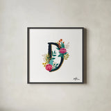 Romantic Luxe Monogram D Black by Janelle Penner. Shown in a sleek black glass frame for a contemporary gallery look. Available as an archival giclee rolled canvas, fine art paper, or poster print. SKU 38235a.