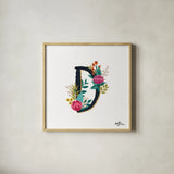 Romantic Luxe Monogram D Black by Janelle Penner. Shown in a natural wood glass frame for a timeless modern aesthetic. Available as an archival giclee rolled canvas, fine art paper, or poster print. SKU 38235a.