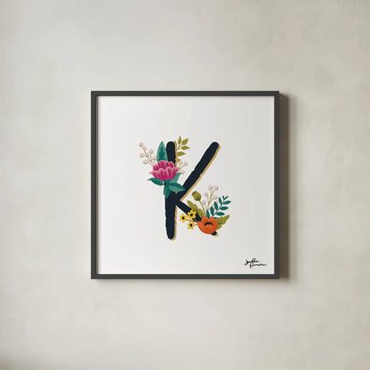 Romantic Luxe Monogram K Black by Janelle Penner. Shown in a sleek black glass frame for a contemporary gallery look. Available as an archival giclee rolled canvas, fine art paper, or poster print. SKU 38237a.