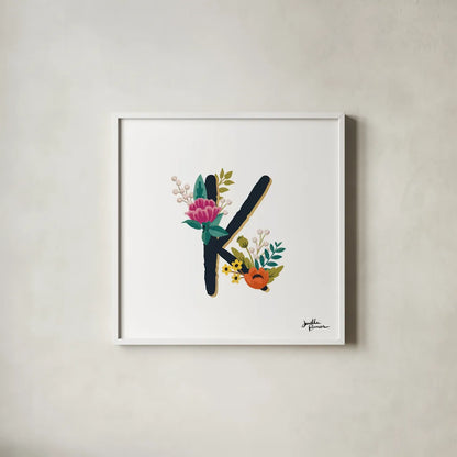 Romantic Luxe Monogram K Black by Janelle Penner. Shown in a crisp white glass frame for a clean and minimalist style. Available as an archival giclee rolled canvas, fine art paper, or poster print. SKU 38237a.