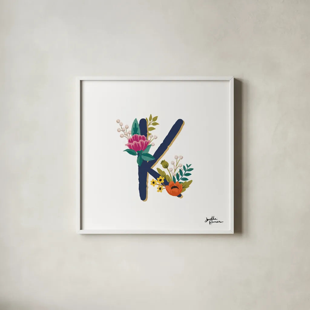 Romantic Luxe Monogram K Navy by Janelle Penner. Shown in a crisp white glass frame for a clean and minimalist style. Available as an archival giclee rolled canvas, fine art paper, or poster print. SKU 38276a.