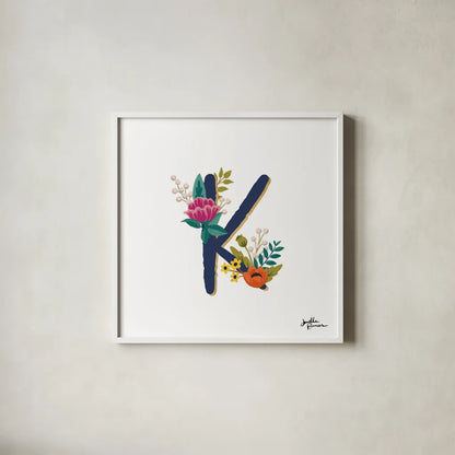 Romantic Luxe Monogram K Navy by Janelle Penner. Shown in a crisp white glass frame for a clean and minimalist style. Available as an archival giclee rolled canvas, fine art paper, or poster print. SKU 38276a.