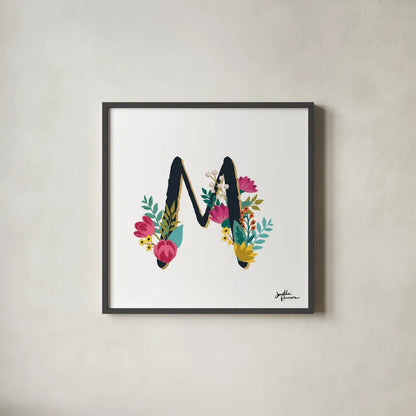 Romantic Luxe Monogram M Black by Janelle Penner. Shown in a sleek black glass frame for a contemporary gallery look. Available as an archival giclee rolled canvas, fine art paper, or poster print. SKU 38239a.
