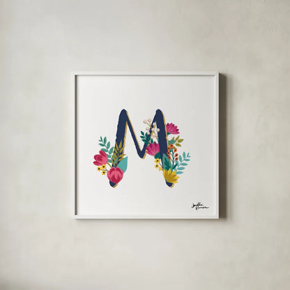 Romantic Luxe Monogram M Navy by Janelle Penner. Shown in a crisp white glass frame for a clean and minimalist style. Available as an archival giclee rolled canvas, fine art paper, or poster print. SKU 38278a.