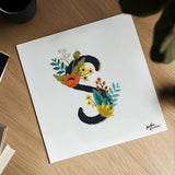 Romantic Luxe Monogram S Black by Janelle Penner. Shown as a detailed flat fine art print, highlighting archival giclee quality. Available as an archival giclee rolled canvas, fine art paper, or poster print. SKU 38240a.