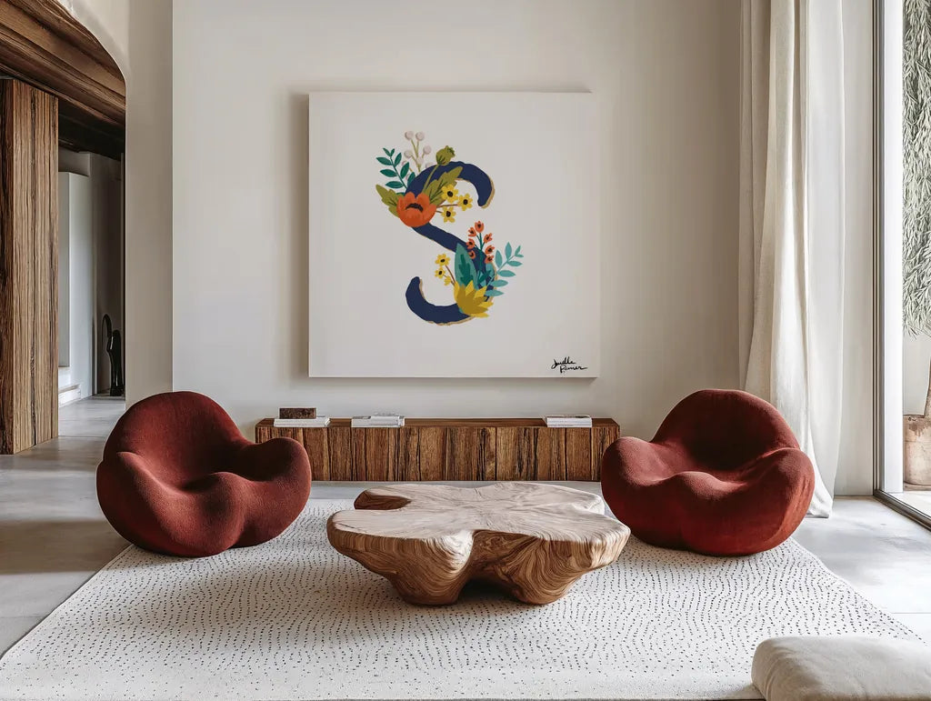 Romantic Luxe Monogram S Navy by Janelle Penner. Shown as extra-large giant wall art in a modern living room. Available as an archival giclee rolled canvas, fine art paper, or poster print. SKU 38279a.