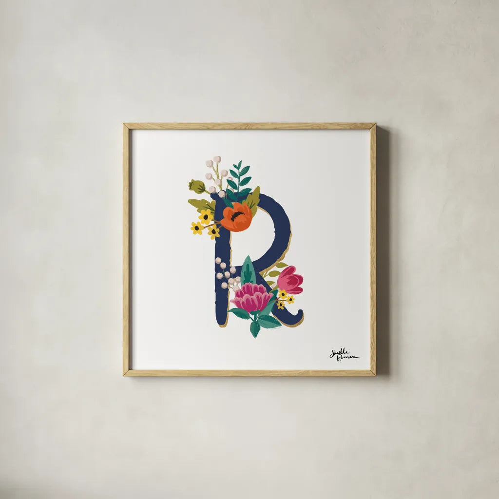 Romantic Luxe R Navy by Janelle Penner. Shown in a natural wood glass frame for a timeless modern aesthetic. Available as an archival giclee rolled canvas, fine art paper, or poster print. SKU 74240a.