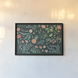 Seaside Botanical I Dark by Janelle Penner. shown as a paper print in a black flame. Available as a archival giclee rolled canvas, fine art paper, or poster print. SKU 57013i.