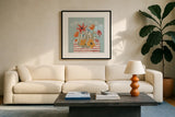 Spiced Petals V by Janelle Penner. Displayed in a glass frame with matte in a clean modern living room. Available as an archival giclee rolled canvas, fine art paper, or poster print. SKU 60842a.