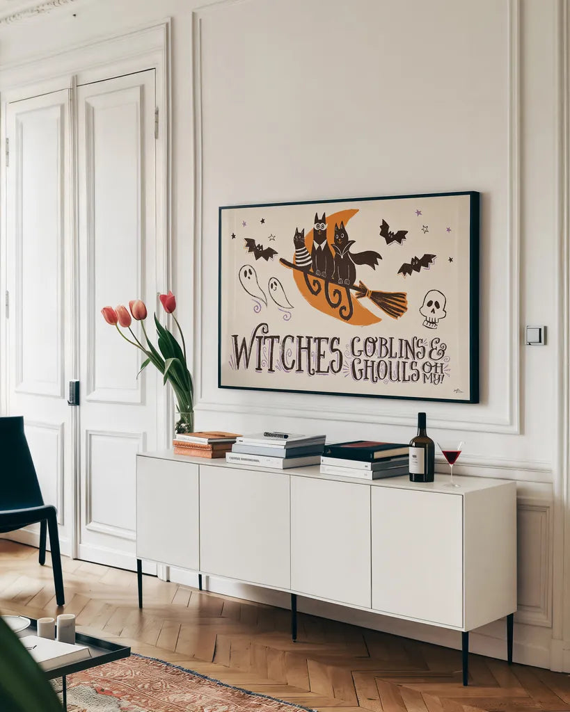 Spooktacular I by Janelle Penner. shown as a framed stretched canvas in a living room above a console. Available as a archival giclee rolled canvas, fine art paper, or poster print. SKU 37846i.