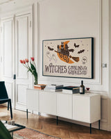 Spooktacular I by Janelle Penner. shown as a framed stretched canvas in a living room above a console. Available as a archival giclee rolled canvas, fine art paper, or poster print. SKU 37846i.