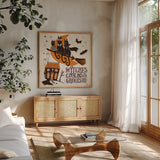Spooktacular II by Janelle Penner. Shown in a natural wood frame in a cozy modern living room. Available as an archival giclee rolled canvas, fine art paper, or poster print. SKU 37847a.