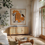Spooktacular IV by Janelle Penner. Shown in a natural wood frame in a cozy modern living room. Available as an archival giclee rolled canvas, fine art paper, or poster print. SKU 37849a.