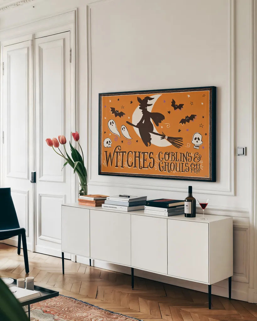 Spooktacular X by Janelle Penner. shown as a framed stretched canvas in a living room above a console. Available as a archival giclee rolled canvas, fine art paper, or poster print. SKU 37855i.