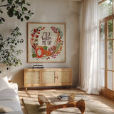 Spread the Love IV by Janelle Penner. Shown in a natural wood frame in a cozy modern living room. Available as an archival giclee rolled canvas, fine art paper, or poster print. SKU 48960a.