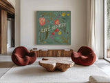 Spring Botanicals VI Sage by Janelle Penner. Shown as extra-large giant wall art in a modern living room. Available as an archival giclee rolled canvas, fine art paper, or poster print. SKU 69173a.